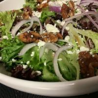 1500 Park Place Salad · Seasonal mixed greens, candied walnuts, goat cheese, red onion, white balsamic vinaigrette.