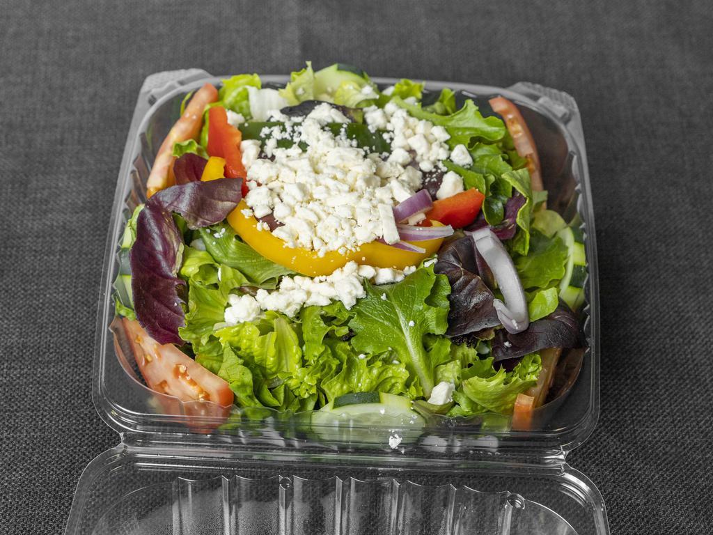 Greek Salad · Mixed greens, feta cheese, Kalamata olives, tomato, red onion, and cucumber.