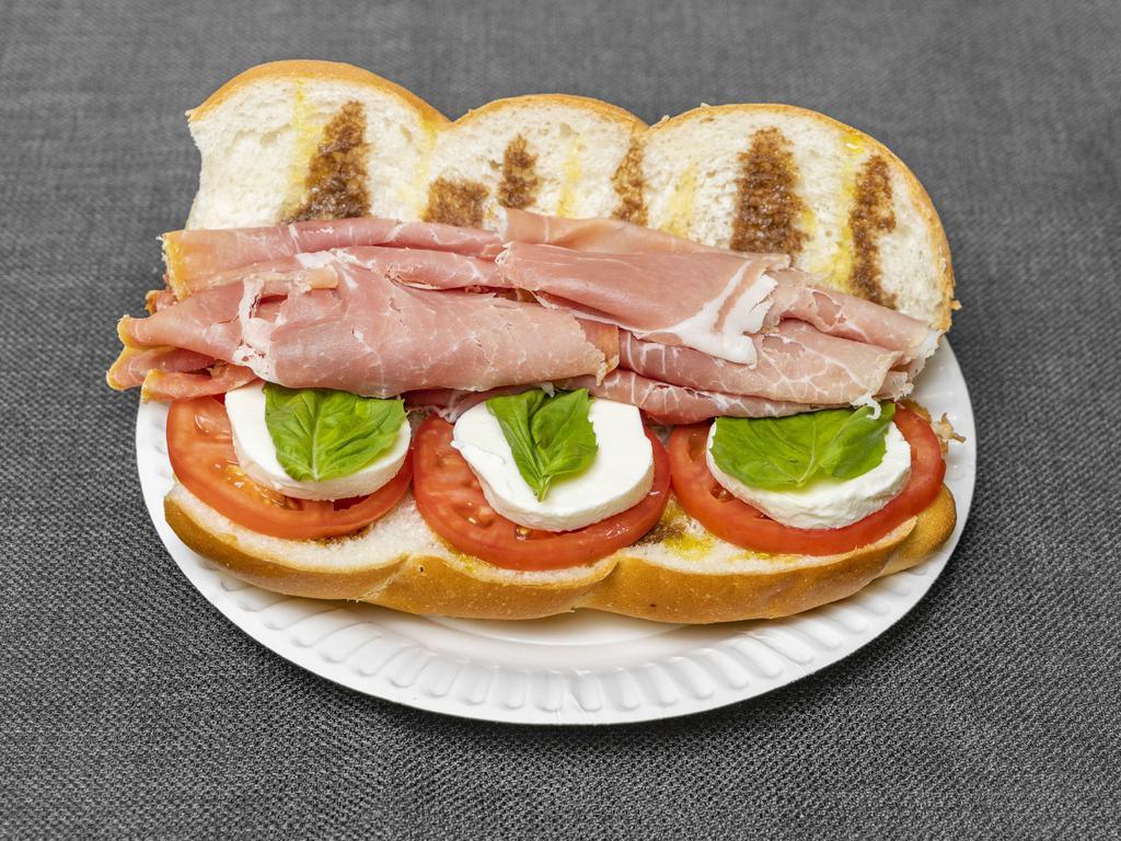 Prosciutto Classic Sandwich · Fresh sliced prosciutto, fresh mozzarella cheese, tomato, basil, balsamic vinegar, and olive oil.
