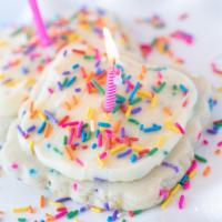 Birthday Cake Cookie · Buttery sugar cookie topped in cake batter frosting, all covered in rainbow sprinkles