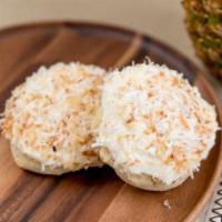 Pina Colada Cookie · A soft cookie filled with real crushed pineapple and topped with sweet coconut frosting and ...