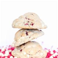Raspberry White Chocolate Chip Cookie · This unique cookie is filled with sweet vanilla chips and a surprisingly fresh pop of raspbe...