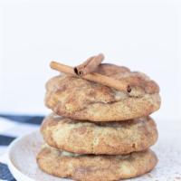Snickerdoodle Cookie · Huge chewy cookie filled with swirls of cinnamon roll filling and surrounded by a slightly c...
