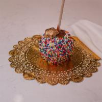 Birthday Bash Caramel Apple · Caramel apple dunked in white chocolate and rolled in birthday sprinkles.