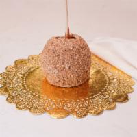 Pecan Pie Caramel Apple · Caramel apple dunked in white chocolate, rolled in a mix of pecans, cinnamon, brown sugar an...
