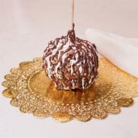 Tsunami Caramel Apple · Caramel apple with 4 nuts: almonds, cashews, peanuts and pecans; finished with white and mil...