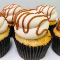 Salted Caramel · Brown sugar cake, filled with caramel sauce iced with caramel buttercream and topped with ca...