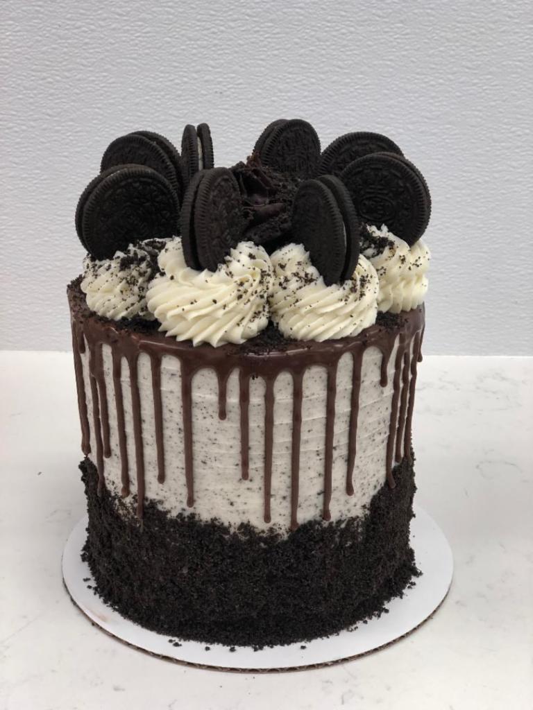 CAKE SLICE · This tasty CAKE SLICE is now offered.  A random slice will be chosen and arrive at your door.  The variety of flavor may include:  Cookies and Cream Cake, Champagne Cake, Salted Caramel Cake, or Rainbow Cake.