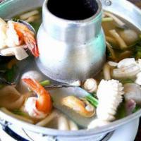  Tom Yum Seafood (Pot) ·  shrimp, scallops, calamari, Mussel spicy soup with galangal, kaffir lime leaves, lemongrass...