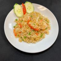  Lanna Fried Rice · Thai fried rice, green peas, carrots, onions, tomatoes with your choice of meat, topped with...