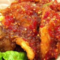  Fish Fillet with Chilli Sauce · Deep-fried fish fillet with Lanna special sweet chili sauce, on top with cilantro and bell p...