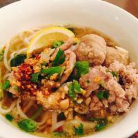  Tom Yum  Pork Noodle Soup · Noodles in Tom Yum broth (spicy and sour) with slice pork, bean sprouts, top with green onio...