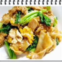 Pad See Ew  · Stir-fried rice noodles with your choice of meat, eggs, broccoli, carrot in sweet black soy ...