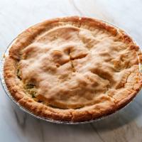 Medium Size frozen Chicken Pot Pie · Chicken, peas, carrots, onions, cream sauces, toped off with a light and sweet pie crust. 

