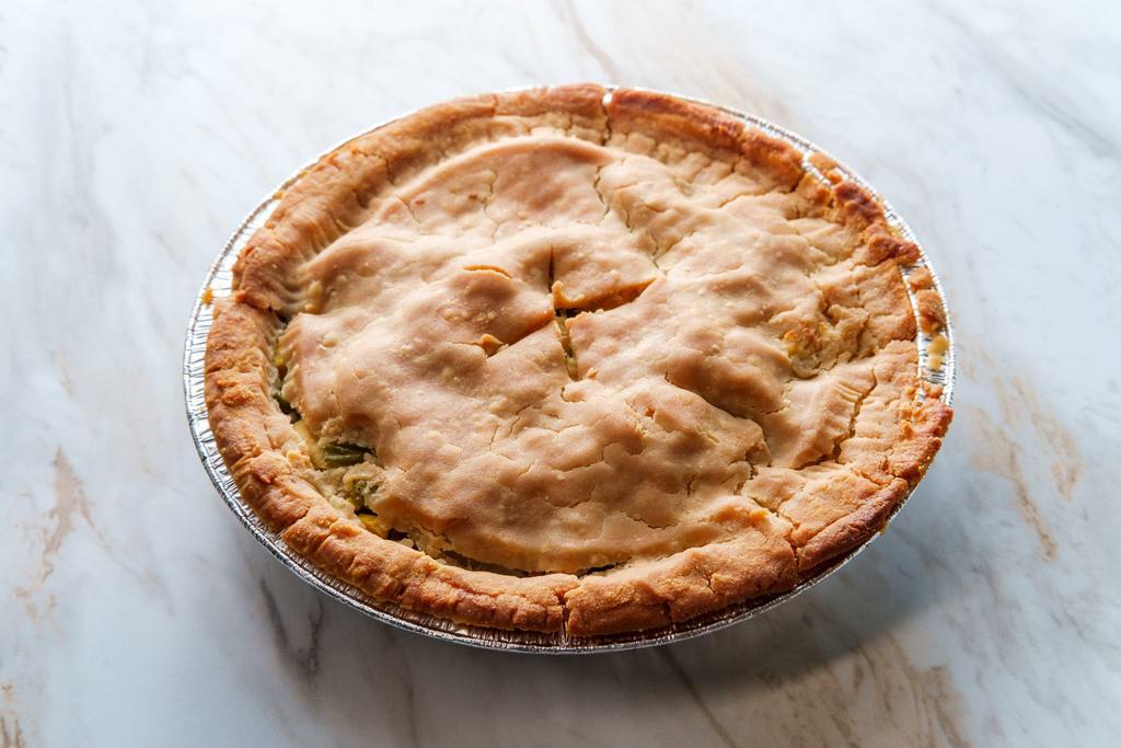 larger Chicken Pot pie frozen · Love how grandma made that chicken pot pie on a cold winter day, made with creamy chicken cubes, sautéed vegetables, and topped with an easy baked puff pastry crust.Frozen and ready for you to order. 

