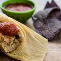 Bulk Frozen Tamales · A masa dough filled with meat, veggies, and sauces wrapped in a corn husk and steamed till f...