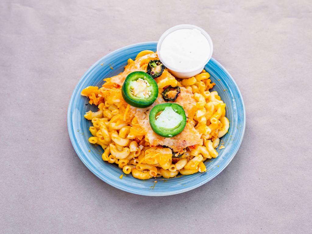 frozen BBQ Mac and Cheese Family Size · Feeds 4-6 People, maid with our homemade BBQ sauces, mixed in with a slow roasted pork on top out famous mac-n-cheese. 

