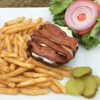 Pangea Burger  · This amazing favorite is maid with 100% Angus Beef, Lettuce ,tomato, onion, your choice of c...
