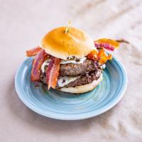 Mammoth Burger  · 2 8oz Angus Beef Pattys stacked with 2 slices of apple wood smoked bacon, 2 slices of Americ...