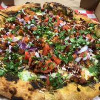 Mexican Pizza · Our house made spicy green cilantro sauce and fresh mozzarella forms the basis of this pizza...