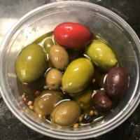 Mixed Olives · A 1/2 pint or pint container of mixed olives.