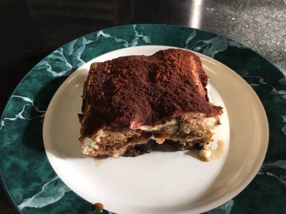 Tiramisu · This is the classic Italian desert. How do we know? Because we make it in house with simply fresh eggs, cream, mascarpone, lady fingers, espresso, and Belgian chocolate.
