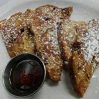 Raisin French Toast · 3 slices of Raisin French Toast with powdered sugar and maple syrup. See additional toppings...