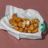Cheese Curds · Filled with gooey mozzarella cheese and bits of jalapenos.