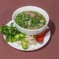Pho Noodle Soup · Herbal beef broth with sliced tender beef steak, beef meatballs, and rice noodles. Served wi...