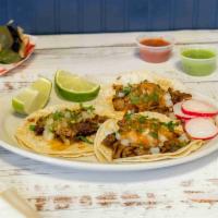 Regular Taco · Any meat, onion, cilantro and hot sauce.