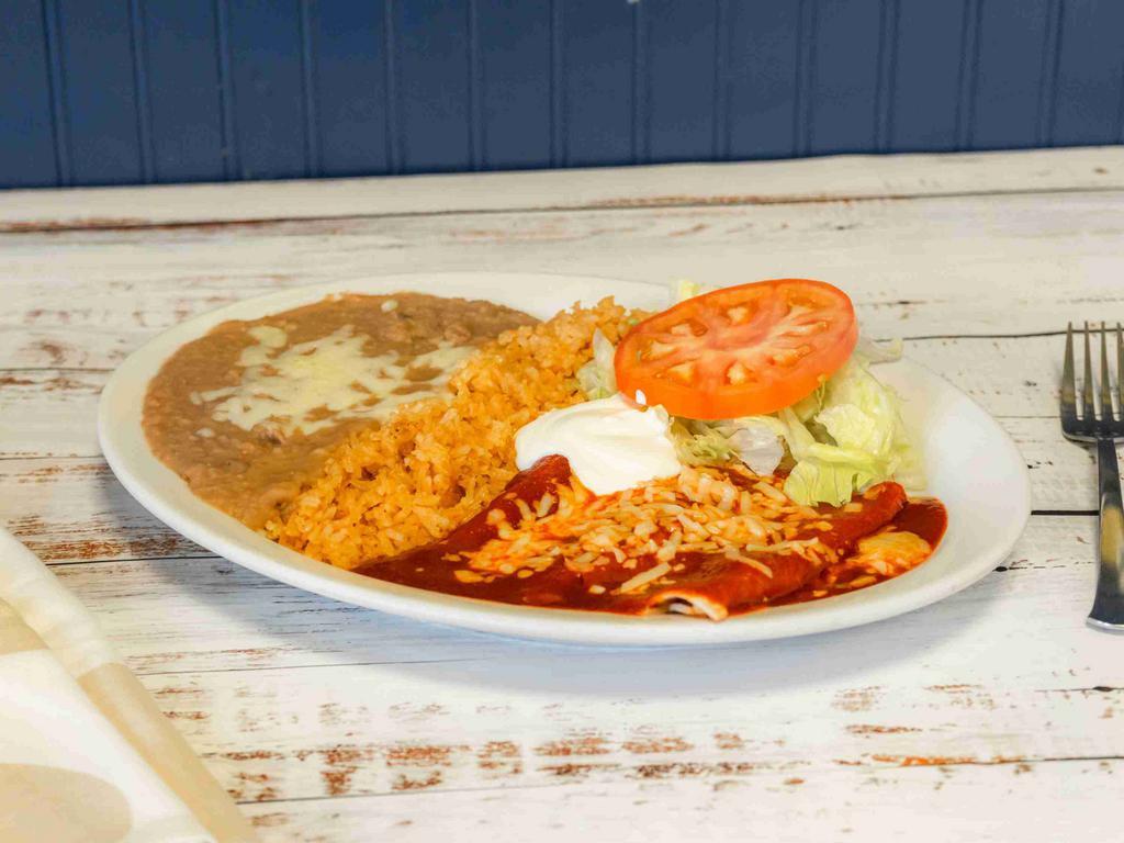 Enchiladas Plate · 2 enchiladas with your choice of meat, cheese, and sour cream, served with rice and beans.