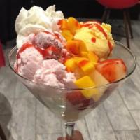 Hawaii Beach Ice Cream · Strawberry, mango, pineapple, whipped cream, home made strawberry sauce, with strawberry ice...