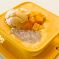2. Mango Madness with Ice Cream · Homemade mango sauce with sago,  fresh mango on top with vanilla ice cream.