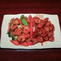 H14. Dragon and Phoenix · Delicious combo of general tso's chicken and shrimp with mixed vegetables. Spicy.