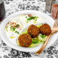 Falafel · Beans mixed with onions, cilantro, parsley and Mediterranean spices.