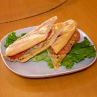 Ave Italiano Sandwich · Chicken breast, tomatoes, avocado and mayo on a baguette.