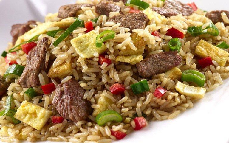 Arroz Chaufa Pollo y Carne · Peruvian cantonese style chicken fried rice with beef