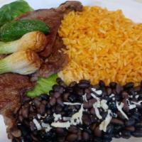 Carne Asada · Served with rice, beans, onion, and jalapeno