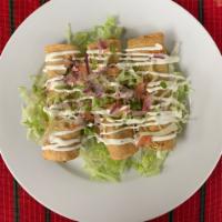 Flautas de Pollo · Tree fried crispy corn tortilla filled with chicken and cheese mix /tomatoes and onions topp...