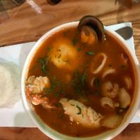 Parihuela · Peruvia  seafood soup, clams, mussels, shrimp, fish and soft shell crab in a rich homade sto...
