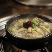Tong Do Ga Ni Tang · Ox knee soup. Served with noodles. Season with salt and green onions to your liking. Extra n...