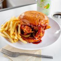 Nashville Hot Chicken Sandwich · 2 tenders with Nashville hot sauce-spice flavor, dill pickles, pickled jalapeno, and boom bo...