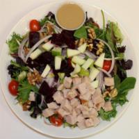 Beet Haven Salad · Mixed greens, beets, tomato, onion, apple, bean sprouts, walnuts, and turkey, lemon goddess ...