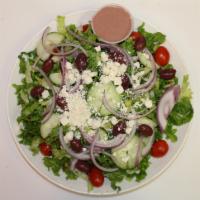 Greek Salad · Romaine, tomatoes, onion, cucumber, Kalamata olives, and feta, Greek olive dressing.