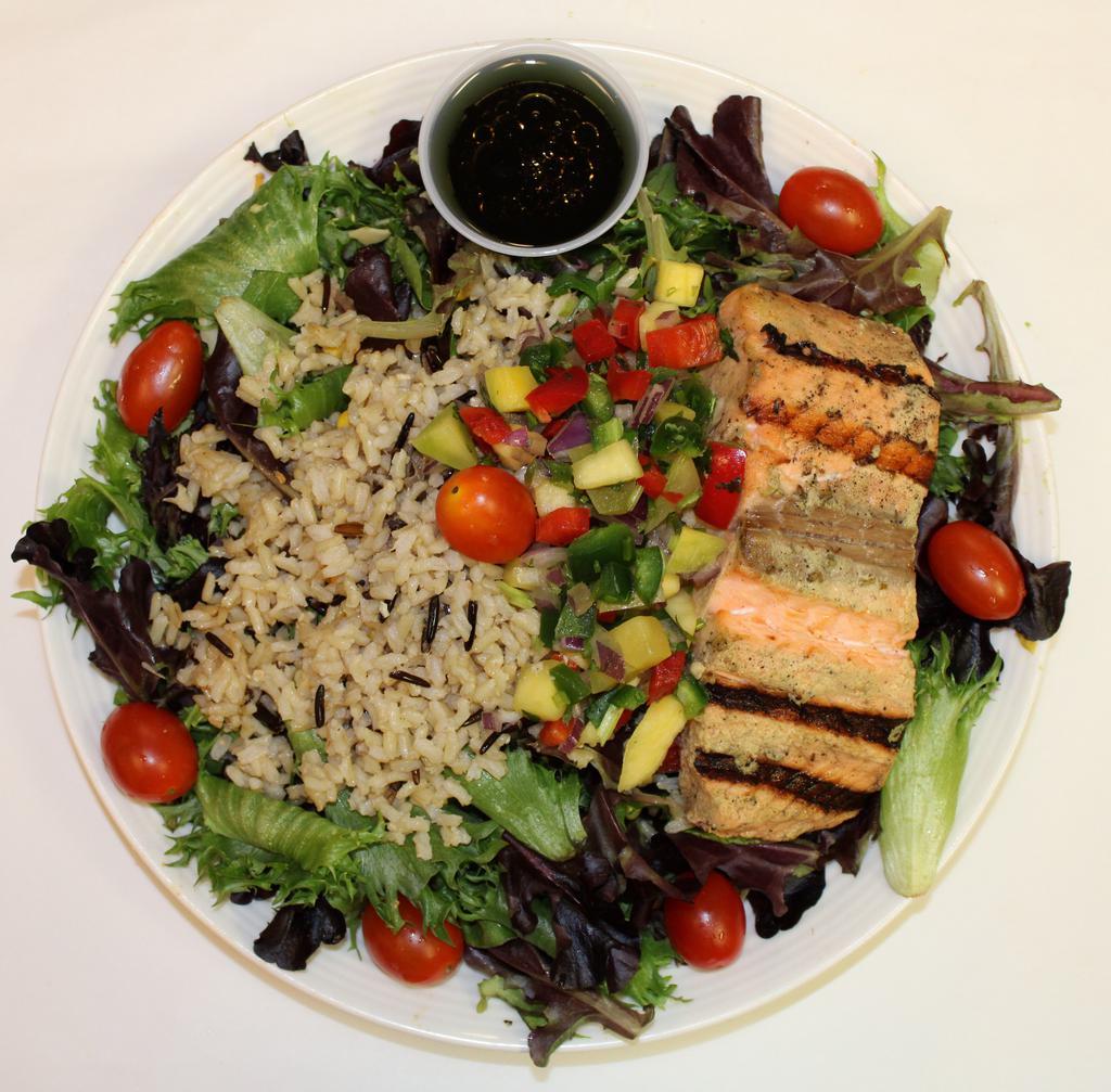 Grilled Salmon Salad · Warm wild rice, warm grilled salmon, mixed greens, tomatoes, and mango salsa balsamic vinaigrette dressing.