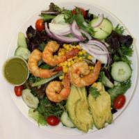 Grilled Shrimp Salad · Mixed greens, grilled shrimp, cucumber, corn, tomatoes, onions, and avocado, cilantro vinaig...