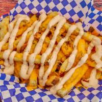All Over Ya Fries · Fries with melted cheese and Baja sauce.