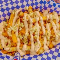 Fully Loaded Fries · Fries with garlic, melted cheddar cheese and Baja sauce.