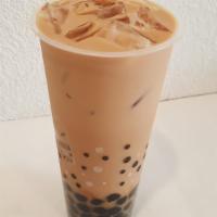 1. House Milk Tea · House-blended black tea  with lactose-free milk with USA Grade A honey pearls.