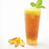 13. Virgin Bellini · Peach oolong tea with crystal pearls topped with housemade peach puree